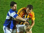 10 October 2009; Jason Stokes, Dromcollogher Broadford, in action against Padraig Browne, Fr.Casey's. Limerick County Senior Football Final, Dromcollogher Broadford v Fr.Casey's, Gaelic Grounds, Limerick. Picture credit: Diarmuid Greene / SPORTSFILE