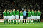 10 October 2009; The Republic of Ireland team stand for a minute's silence before the start of the game. 2010 FIFA World Cup Qualifier, Republic of Ireland v Italy, Croke Park, Dublin. Photo by Sportsfile