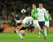 10 October 2009; Robbie Keane, Republic of Ireland, in action against Nicola Legrottaglie and Daniele De Rossi, Italy. 2010 FIFA World Cup Qualifier, Republic of Ireland v Italy, Croke Park, Dublin. Picture credit: Pat Murphy / SPORTSFILE