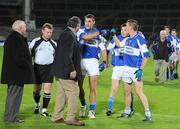 10 October 2009; Fr.Casey's players Michael Galvin, left, John Riordan, centre, and Eoin Joy react after being informed that the match is to be abandoned after Thomas Cahill, Fr.Casey's, picked up a serious injury. Limerick County Senior Football Final, Dromcollogher Broadford v Fr.Casey's, Gaelic Grounds, Limerick. Picture credit: Diarmuid Greene / SPORTSFILE