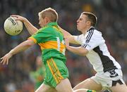 11 October 2009; Glenn O'Connell, Rhode, in action against Paul Mitchell, Clara. Offaly County Senior Football Final, Rhode v Clara, O'Connor Park, Tullamore, Co. Offaly. Photo by Sportsfile