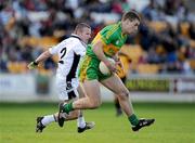 11 October 2009; Niall McNamee, Rhode, in action against Alan Cronin, Clara. Offaly County Senior Football Final, Rhode v Clara, O'Connor Park, Tullamore, Co. Offaly. Photo by Sportsfile