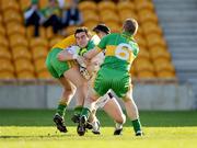 11 October 2009; Thomas Deehan, Clara, in action against Kenneth Garry, left, and Brian Darby, Rhode. Offaly County Senior Football Final, Rhode v Clara, O'Connor Park, Tullamore, Co. Offaly. Photo by Sportsfile