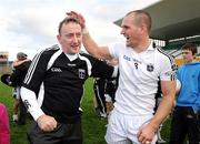 11 October 2009; Clara captain Scott Brady celebrates with manager Pat Flanagan at the end of the game. Offaly County Senior Football Final, Rhode v Clara, O'Connor Park, Tullamore, Co. Offaly. Photo by Sportsfile