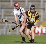 11 October 2009; James Coyle, Ballycran, in action against Kevin Hinphey, Dungiven Kevin Lynch's. AIB Ulster Senior Hurling Championship Semi-Final, Ballycran v Dungiven Kevin Lynch's, Casement Park, Belfast. Picture credit: Oliver McVeigh / SPORTSFILE