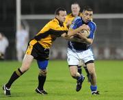 26 September 2009; Sean Burns, St. Gall's, in action against Paddy Carey, Portglenone Roger Casements. Antrim Senior County Football Final, St. Gall's, Belfast v Portglenone Roger Casements, Casement Park, Belfast, Co. Antrim. Picture credit: Oliver McVeigh / SPORTSFILE