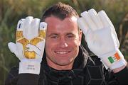 12 October 2009; Republic of Ireland goalkeeper Shay Given pictured with a pair of specially commissioned PUMA goalkeeping gloves to mark his 100th cap for Ireland. He will wear them against Montenegro this Wednesday, 14 October. Portmarnock Beach, Portmarnock, Dublin. Picture credit: David Maher / SPORTSFILE