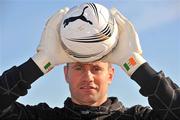 12 October 2009; Republic of Ireland goalkeeper Shay Given pictured with a pair of specially commissioned PUMA goalkeeping gloves to mark his 100th cap for Ireland. He will wear them against Montenegro this Wednesday, 14 October. Portmarnock Beach, Portmarnock, Dublin. Picture credit: David Maher / SPORTSFILE