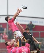 16 January 2016; Jonathan Ross, Stade Francais, takes a lineout ahead of Dave Foley, Munster. European Rugby Champions Cup, Pool 4, Round 5, Munster v Stade Francais. Thomond Park, Limerick. Picture credit: Diarmuid Greene / SPORTSFILE
