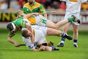 18 October 2009; Kevin Martin, Tullamore, is fouled by Damien Kilmartin, Kilcormac/Killoughey, which led to a penalty for Tullamore which was missed. Offaly County Senior Hurling Final, Tullamore v Kilcormac/Killoughey, O'Connor Park, Tullamore, Co. Offaly. Picture credit: Pat Murphy / SPORTSFILE