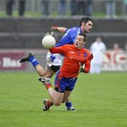 18 October 2009; Barry Collins, Dromore, in action against Brian McGuigan, Ardboe. Tyrone County Senior Football Final, Dromore v Ardboe, Healy Park, Omagh, Co. Tyrone. Picture credit: Michael Cullen / SPORTSFILE
