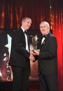 16 October 2009; Henry Shefflin, of Kilkenny, is presented with his GAA Hurling All-Star award by Uachtarán CLG Criostóir Ó Cuana during the 2009 GAA All-Stars Awards, sponsored by Vodafone. Citywest Hotel, Conference, Leisure & Golf Resort, Dublin. Picture credit: Ray McManus / SPORTSFILE