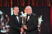 16 October 2009; Ollie Canning, of Galway, is presented with his GAA Hurling All-Star award by Uachtarán CLG Criostóir Ó Cuana during the 2009 GAA All-Stars Awards, sponsored by Vodafone. Citywest Hotel, Conference, Leisure & Golf Resort, Dublin. Picture credit: Brendan Moran / SPORTSFILE