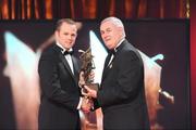 16 October 2009; Tommy Walsh, of Kilkenny, is presented with his GAA Hurling All-Star award by Uachtarán CLG Criostóir Ó Cuana during the 2009 GAA All-Stars Awards, sponsored by Vodafone. Citywest Hotel, Conference, Leisure & Golf Resort, Dublin. Picture credit: Brendan Moran / SPORTSFILE