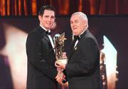 16 October 2009; Conor O'Mahony, of Tipperary, is presented with his GAA Hurling All-Star award by Uachtarán CLG Criostóir Ó Cuana during the 2009 GAA All-Stars Awards, sponsored by Vodafone. Citywest Hotel, Conference, Leisure & Golf Resort, Dublin. Picture credit: Brendan Moran / SPORTSFILE