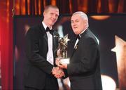 16 October 2009; Henry Shefflin, of Kilkenny, is presented with his GAA Hurling All-Star award by Uachtarán CLG Criostóir Ó Cuana during the 2009 GAA All-Stars Awards, sponsored by Vodafone. Citywest Hotel, Conference, Leisure & Golf Resort, Dublin. Picture credit: Brendan Moran / SPORTSFILE