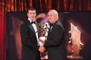 16 October 2009; Michael Rice, of Kilkenny, is presented with his GAA Hurling All-Star award by Uachtarán CLG Criostóir Ó Cuana during the 2009 GAA All-Stars Awards, sponsored by Vodafone. Citywest Hotel, Conference, Leisure & Golf Resort, Dublin. Picture credit: Brendan Moran / SPORTSFILE