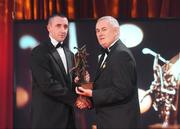 16 October 2009; Eoin Larkin, of Kilkenny, is presented with his GAA Hurling All-Star award by Uachtarán CLG Criostóir Ó Cuana during the 2009 GAA All-Stars Awards, sponsored by Vodafone. Citywest Hotel, Conference, Leisure & Golf Resort, Dublin. Picture credit: Brendan Moran / SPORTSFILE