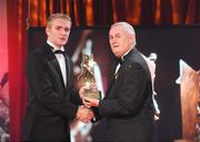 16 October 2009; Noel McGrath, of Tipperary, is presented with his GAA Hurling All-Star award by Uachtarán CLG Criostóir Ó Cuana during the 2009 GAA All-Stars Awards, sponsored by Vodafone. Citywest Hotel, Conference, Leisure & Golf Resort, Dublin. Picture credit: Brendan Moran / SPORTSFILE