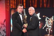 16 October 2009; Joe Canning, of Galway, is presented with his GAA Hurling All-Star award by Uachtarán CLG Criostóir Ó Cuana during the 2009 GAA All-Stars Awards, sponsored by Vodafone. Citywest Hotel, Conference, Leisure & Golf Resort, Dublin. Picture credit: Brendan Moran / SPORTSFILE