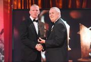 16 October 2009; John Mullane, of Waterford, is presented with his GAA Hurling All-Star award by Uachtarán CLG Criostóir Ó Cuana during the 2009 GAA All-Stars Awards, sponsored by Vodafone. Citywest Hotel, Conference, Leisure & Golf Resort, Dublin. Picture credit: Brendan Moran / SPORTSFILE