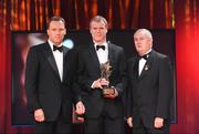 16 October 2009; Diarmuid Murphy, of Kerry, is presented with his GAA Football All-Star award by Uachtarán CLG Criostóir Ó Cuana and Charles Butterworth, CEO Vodafone Ireland, during the 2009 GAA All-Stars Awards, sponsored by Vodafone. Citywest Hotel, Conference, Leisure & Golf Resort, Dublin. Picture credit: Brendan Moran / SPORTSFILE