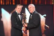 16 October 2009; Tommy Walsh, of Kilkenny, is presented with his GAA Hurling All-Star award by Uachtarán CLG Criostóir Ó Cuana during the 2009 GAA All-Stars Awards, sponsored by Vodafone. Citywest Hotel, Conference, Leisure & Golf Resort, Dublin. Picture credit: Brendan Moran / SPORTSFILE