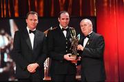 16 October 2009; Dermot Earley, of Kildare, is presented with his GAA Football All-Star award by Uachtarán CLG Criostóir Ó Cuana and Charles Butterworth, CEO Vodafone Ireland, during the 2009 GAA All-Stars Awards, sponsored by Vodafone. Citywest Hotel, Conference, Leisure & Golf Resort, Dublin. Picture credit: Brendan Moran / SPORTSFILE