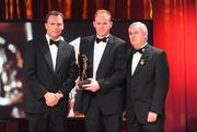 16 October 2009; Seamus Scanlon, of Kerry, is presented with his GAA Football All-Star award by Uachtarán CLG Criostóir Ó Cuana and Charles Butterworth, CEO Vodafone Ireland, during the 2009 GAA All-Stars Awards, sponsored by Vodafone. Citywest Hotel, Conference, Leisure & Golf Resort, Dublin. Picture credit: Brendan Moran / SPORTSFILE