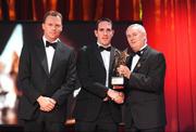 16 October 2009; Declan O'Sullivan, of Kerry, is presented with his GAA Football All-Star award by Uachtarán CLG Criostóir Ó Cuana and Charles Butterworth, CEO Vodafone Ireland, during the 2009 GAA All-Stars Awards, sponsored by Vodafone. Citywest Hotel, Conference, Leisure & Golf Resort, Dublin. Picture credit: Brendan Moran / SPORTSFILE