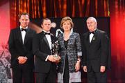 16 October 2009; Tommy Walsh, of Kilkenny, is presented with his GAA Hurler All-Star of the Year award by President of Ireland Mary McAleese, Uachtarán CLG Criostóir Ó Cuana and Charles Butterworth, CEO Vodafone Ireland, during the 2009 GAA All-Stars Awards, sponsored by Vodafone. Citywest Hotel, Conference, Leisure & Golf Resort, Dublin. Picture credit: Brendan Moran / SPORTSFILE