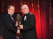 16 October 2009; Tommy Walsh, of Kilkenny, is presented with his GAA Hurling All-Star award by Uachtarán CLG Criostóir Ó Cuana during the 2009 GAA All-Stars Awards, sponsored by Vodafone. Citywest Hotel, Conference, Leisure & Golf Resort, Dublin. Picture credit: Ray McManus / SPORTSFILE