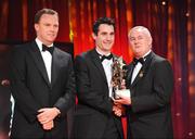 16 October 2009; Tom O'Sullivan, of Kerry, is presented with his GAA Football All-Star award by Uachtarán CLG Criostóir Ó Cuana and Charles Butterworth, CEO Vodafone Ireland, during the 2009 GAA All-Stars Awards, sponsored by Vodafone. Citywest Hotel, Conference, Leisure & Golf Resort, Dublin. Picture credit: Ray McManus / SPORTSFILE
