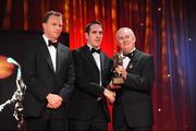 16 October 2009; Declan O'Sullivan, is presented with his GAA Football All-Star award by Uachtarán CLG Criostóir Ó Cuana and Charles Butterworth, CEO Vodafone Ireland, during the 2009 GAA All-Stars Awards, sponsored by Vodafone. Citywest Hotel, Conference, Leisure & Golf Resort, Dublin. Picture credit: Ray McManus / SPORTSFILE