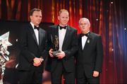 16 October 2009; Seamus Scanlon, of Kerry, is presented with his GAA Football All-Star award by Uachtarán CLG Criostóir Ó Cuana and Charles Butterworth, CEO Vodafone Ireland, during the 2009 GAA All-Stars Awards, sponsored by Vodafone. Citywest Hotel, Conference, Leisure & Golf Resort, Dublin. Picture credit: Ray McManus / SPORTSFILE