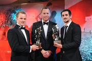 16 October 2009; Tommy Walsh, of Kilkenny, with his GAA All-Star Hurler of the Year award, and Paul Galvin, with his GAA All-Star Footballer of the Year award, with Charles Butterworth, CEO Vodafone Ireland, during the 2009 GAA All-Stars Awards, sponsored by Vodafone. Citywest Hotel, Conference, Leisure & Golf Resort, Dublin. Picture credit: Brendan Moran / SPORTSFILE