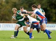 18 October 2009; Sean Heskety, Ireland, is tackled by Serbia players, from left, Vuk Turedisk, Ivan Susnjara and Aleksandar Sic. Rugby League International, Ireland v Serbia, Tullamore RFC, Tullamore, Co. Offaly. Picture credit: Stephen McCarthy / SPORTSFILE