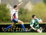18 October 2009; Karl Fitzpatrick, Ireland, goes over for his side's fifth try despite the attention of Nenad Grbie, Serbia. Rugby League International, Ireland v Serbia, Tullamore RFC, Tullamore, Co. Offaly. Picture credit: Stephen McCarthy / SPORTSFILE