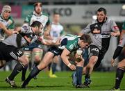 16 January 2016; AJ MacGinty, Connacht, is tackled by Guillaume Ribes, Brive. European Rugby Challenge Cup, Pool 1, Round 5, Brive v Connacht. Stade Amédée-Domenech, Brive-la-Gaillarde, France. Picture credit: Ray Ryan / SPORTSFILE