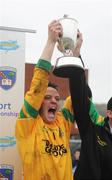 18 October 2009; Pearse Óg captain Ciaran McKinney lifts the Gerry Fegan cup. Armagh County Senior Football Final, Armagh Harps v Pearse Óg, Athletic Grounds, Armagh. Photo by Sportsfile