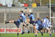 18 October 2009;  St. Jude's players left to right, Andy Glover, Colm Murphy and Brian Monaghan, 12,  in action against  Ballyboden St. Enda's Michael MacAuley, left, and Dara Nelson, 5. Dublin County Senior Football Final, Ballyboden St. Enda's v St. Jude's, Parnell Park, Dublin. Picture credit: David Maher / SPORTSFILE