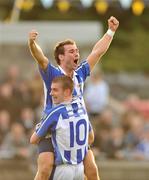18 October 2009; Shane Durkin, Ballyboden St. Enda's, celebrates with his team-mate Paul Galvin, no.10, at the end of the game. Dublin County Senior Football Final, Ballyboden St. Enda's v St. Jude's, Parnell Park, Dublin. Picture credit: David Maher / SPORTSFILE