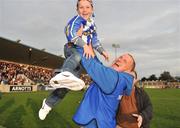 18 October 2009; Liam O'Dwyer, Ballyboden St. Enda's manager, celebrates with his son Ryan, at the end of the game. Dublin County Senior Football Final, Ballyboden St. Enda's v St. Jude's, Parnell Park, Dublin. Picture credit: David Maher / SPORTSFILE