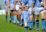 18 October 2009; 3-year-old Lucy Hartnett, with her dad Brian Hartnett of Na Piarsaigh, during the pre-match parade. Limerick County Senior Hurling Final, Adare v Na Piarsaigh, Gaelic Grounds, Limerick. Picture credit: Diarmuid Greene / SPORTSFILE