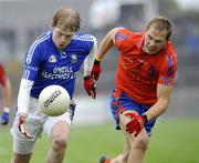 18 October 2009; Shaun O'Neill, Dromore, in action against Martin McKeown, Ardboe. Tyrone County Senior Football Final, Dromore v Ardboe, Healy Park, Omagh, Co. Tyrone. Picture credit: Michael Cullen / SPORTSFILE
