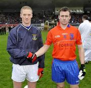 18 October 2009; Captains Colm McCullagh, Dromore, and Ciaran Campbell, Ardboe, shake hands before the game. Tyrone County Senior Football Final, Dromore v Ardboe, Healy Park, Omagh, Co. Tyrone. Picture credit: Michael Cullen / SPORTSFILE