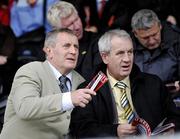 18 October 2009; 1984 Ardboe and Tyrone players Frank McGuigan and Mickey John Forbes  watching the action. Tyrone County Senior Football Final, Dromore v Ardboe, Healy Park, Omagh, Co. Tyrone. Picture credit: Michael Cullen / SPORTSFILE