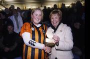 19 November 2006; Player of the match Marie O'Connor, St. Lachtain's is presented with the award by Liz Howard, President, Cumann Camogaiochta na nGael. All-Ireland Senior Camogie Club Championship Final, St Lachtain's v O'Donovan Rossa, O'Moore Park, Portlaoise, Co. Laois. Picture credit: Brian Lawless / SPORTSFILE