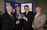 22 July 2007; Frank Slevin, Bray, former Race Director of the Womens Mini Marathon, is presented with a special recognition award by, from right, Frank Greally, Editor Irish Runner, Michael Heery, President Athletics Ireland, and John Foley, Chief Executive Waterford Crystal. Waterford Crystal / Irish Runner Athletics Awards, ALSAA, Dublin Airport, Dublin. Picture credit: Ray McManus / SPORTSFILE