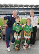 28 September 2009; 288 children from all over the country togged out today in the world-famous Croke Park stadium to attend the Vhi GAA Cúl Day Out. The 288 children were the lucky winners in the competition which was open to 82,500 children who attended a Vhi GAA Cúl Camp during the summer. Pictured after receiving their medals are James O'Shea, from Youghal, Co. Cork, left, and Anna Buckley, from Millstreet, Co. Cork, with Vhi GAA Cúl Camps Ambassadors John Mullane, Waterford hurler, and Sinead Cahalane, Galway Camogie captain. Croke Park, Dublin. Picture credit: Stephen McCarthy / SPORTSFILE